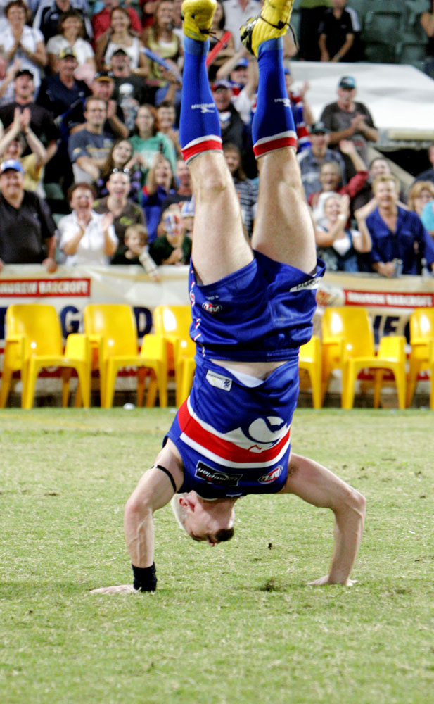 Akermanis Brings Back The Hand Stand