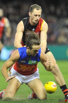 James Kelly spoils Rhys Mathieson attack on the ball