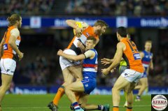 Dawson Simpson evades the Josh Dunkley tackle