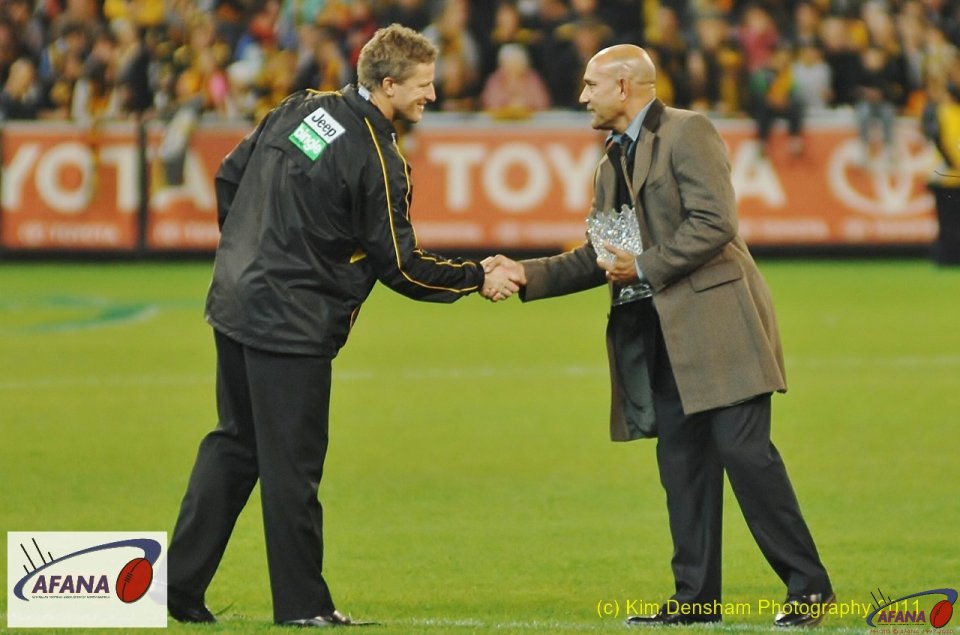 Tigers Coach Damian Hardwick Receives The Cup