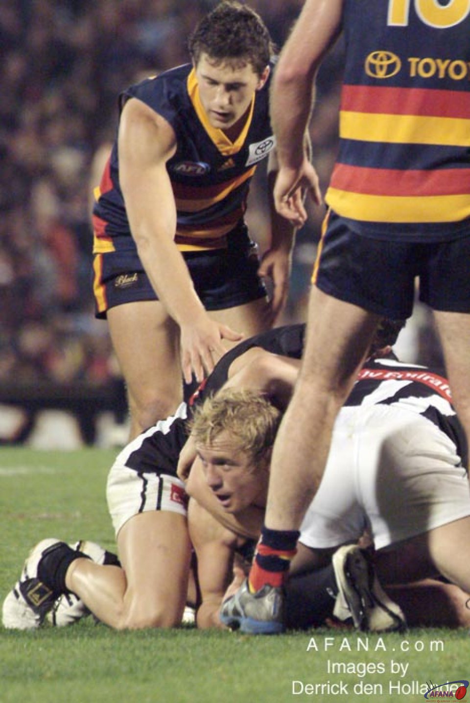 [b]The Crows Matthew Bode, typically scrambling under a pack of players at AAMI Stadium[/b]