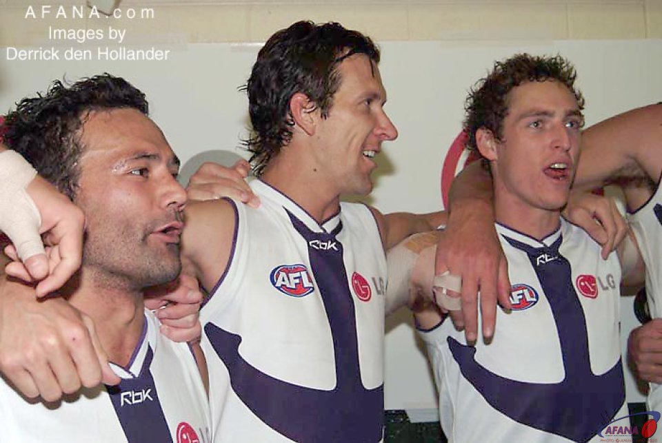 [b]Spils of victory - Peter Bell and the Carr brothers belt out the Docker's club song[/b]