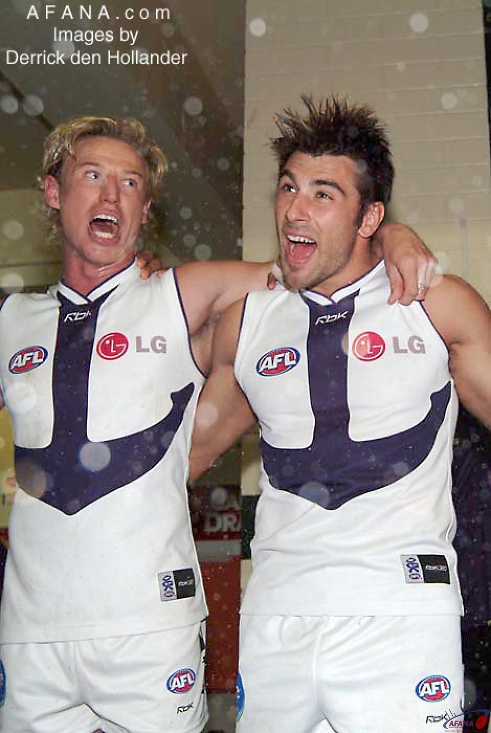 [b]Shaun McManus and Heath Black sing the club song after an important victory[/b]