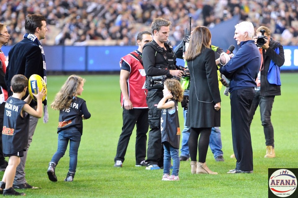 Christy Malthouse inteviews Mick on his 715 game record surrounded by grandkids