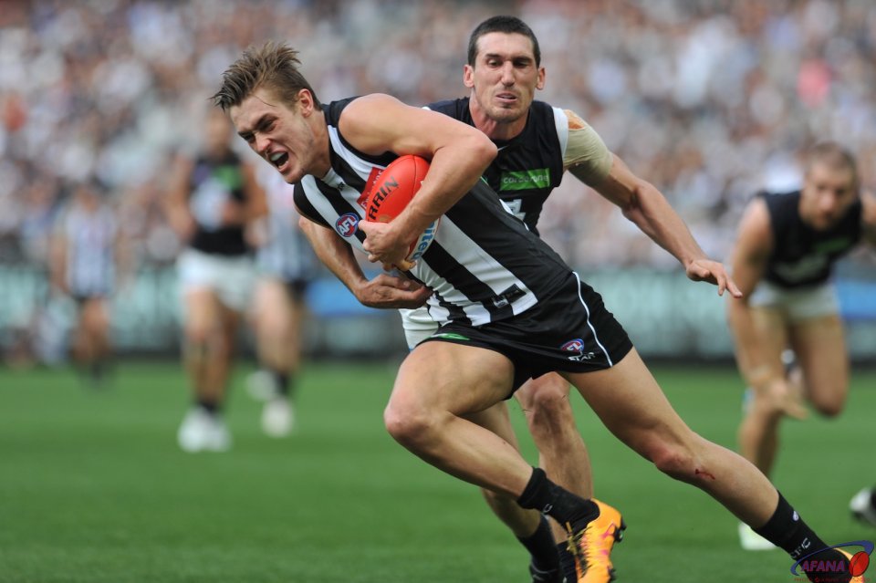 Darcy Moore barges through
