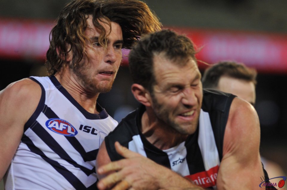 Cloke makes his prescence felt in this tackle on Connor Blakely