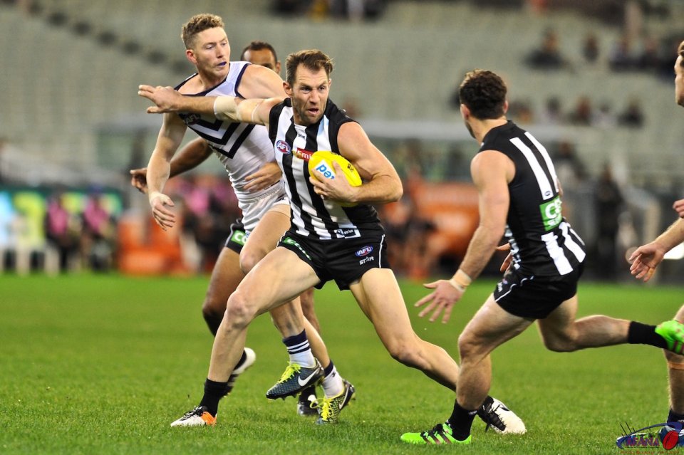 Travis Cloke shows his power and aggression as he positions himself for a snap at goal