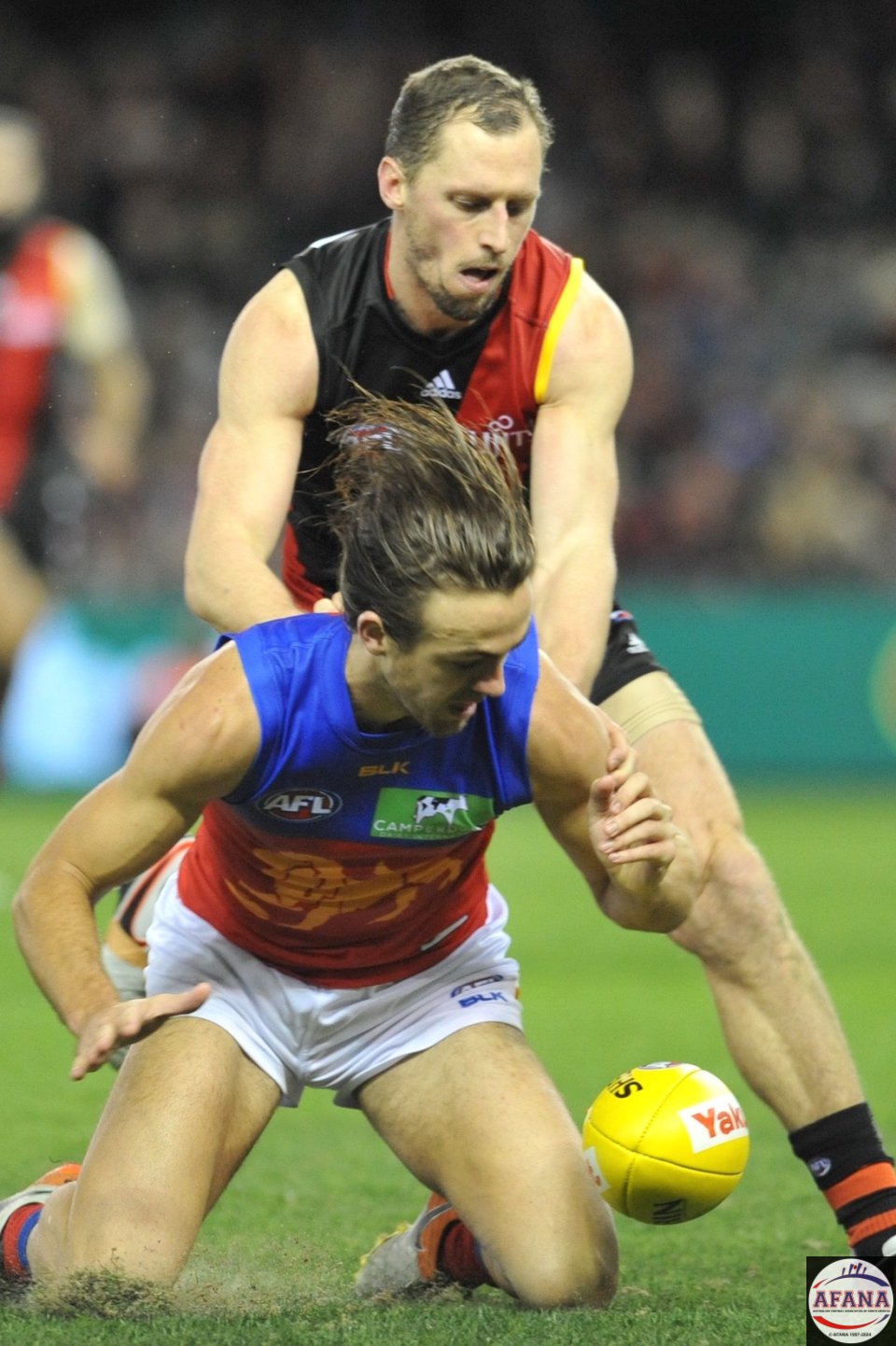 James Kelly spoils Rhys Mathieson attack on the ball