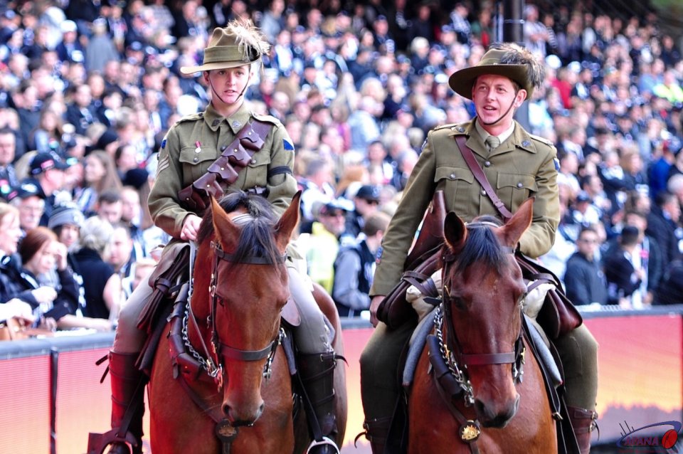 ANZAC horses lead the cavalcade of veterens around the arena