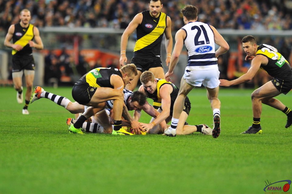Dangerfield double teamed by Grimes and Townsend