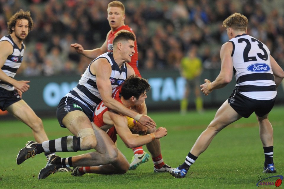 Zak Smith tackles George Hewett as Josh Caddy waits for the crumb