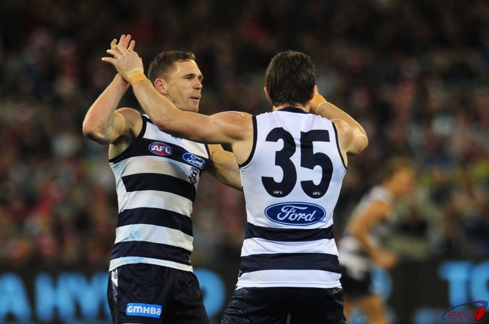 Selwood and Danger celebrate the opening Cats goal