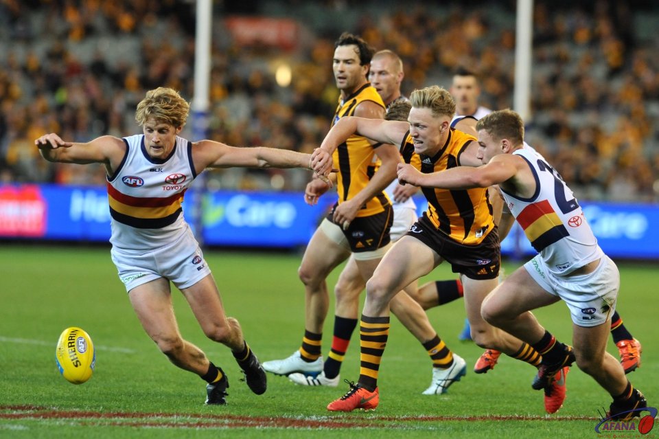 Rory Sloane leads James Sicily and Rory Laird to the ball