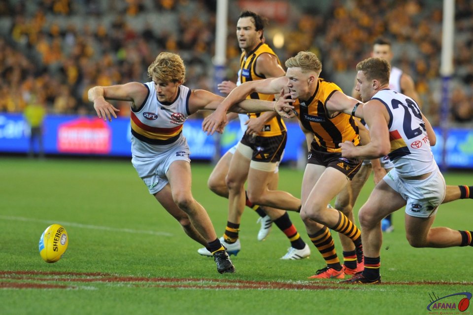Rory Sloane,James Sicily and Rory Laird look to pounce on the loose ball