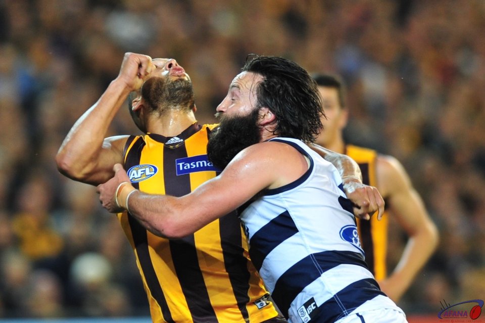 Gibson and Bartel jostle for position as the ball comes in long