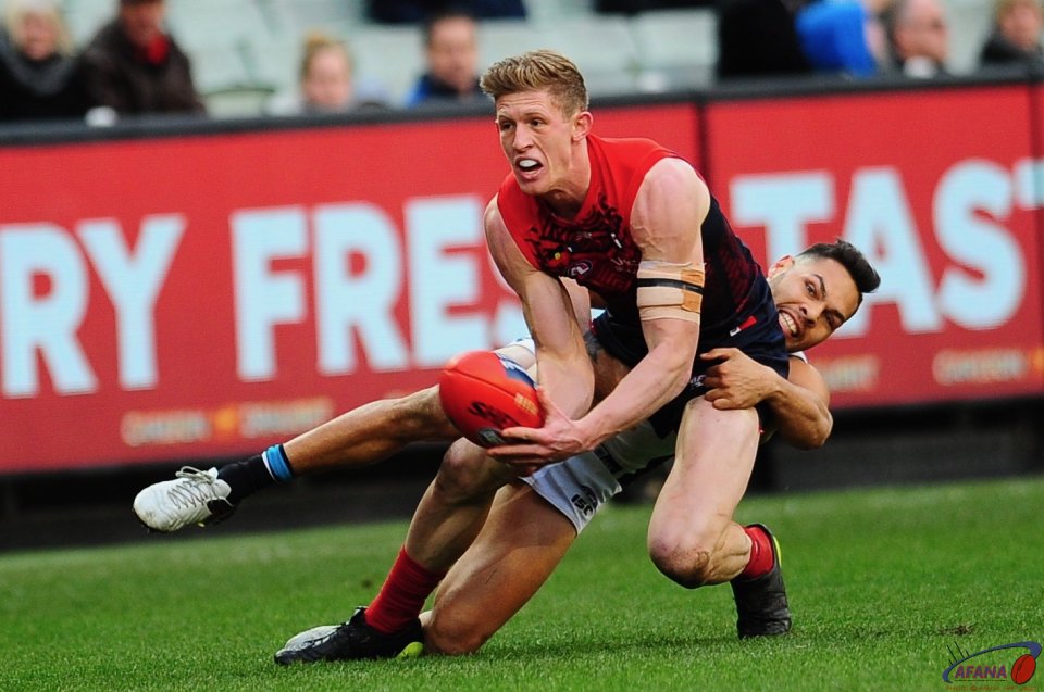 Impey hassles Sam Front deep in Ports attack on goal