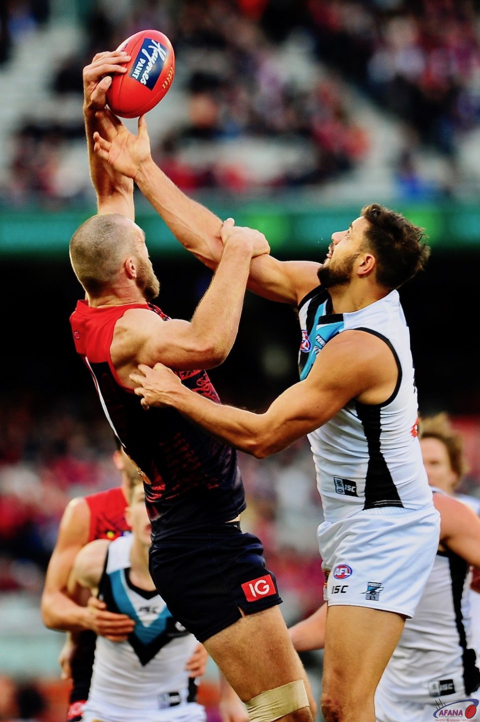 Ryder and Gawn battle in the ruck contest