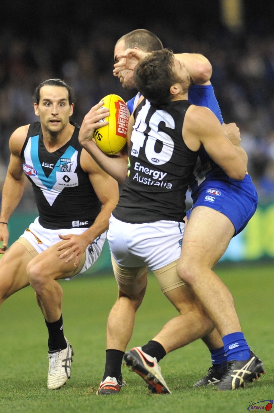 Ben Cunnington gives Sam Gray a solid fend off