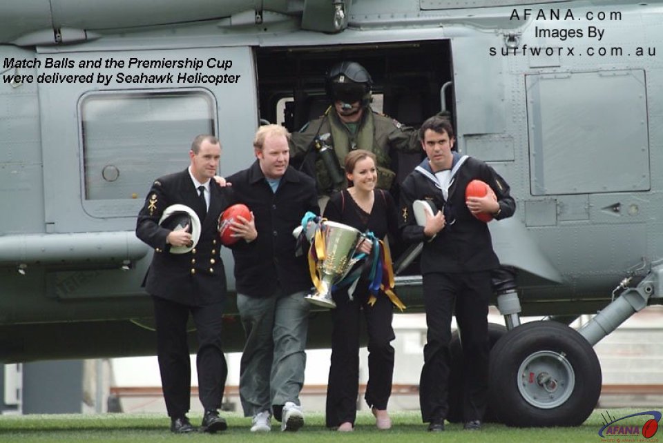 Seahawk helicopter delivers the official match day footballs and the 2004 AFL Premiership Cup