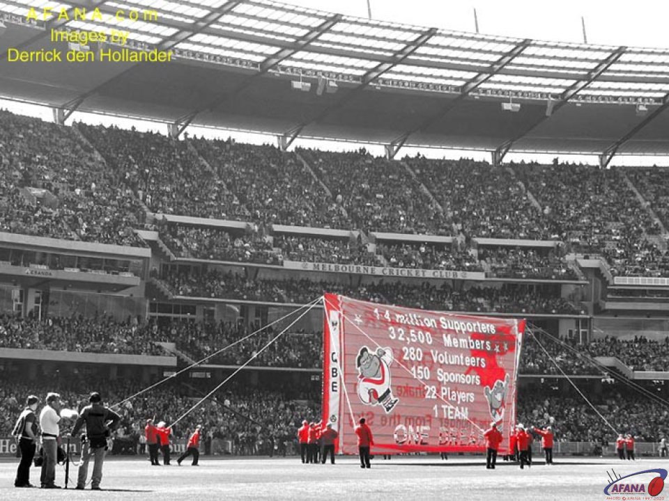 [b]The Swans banner is raised for the players to run through[/b]