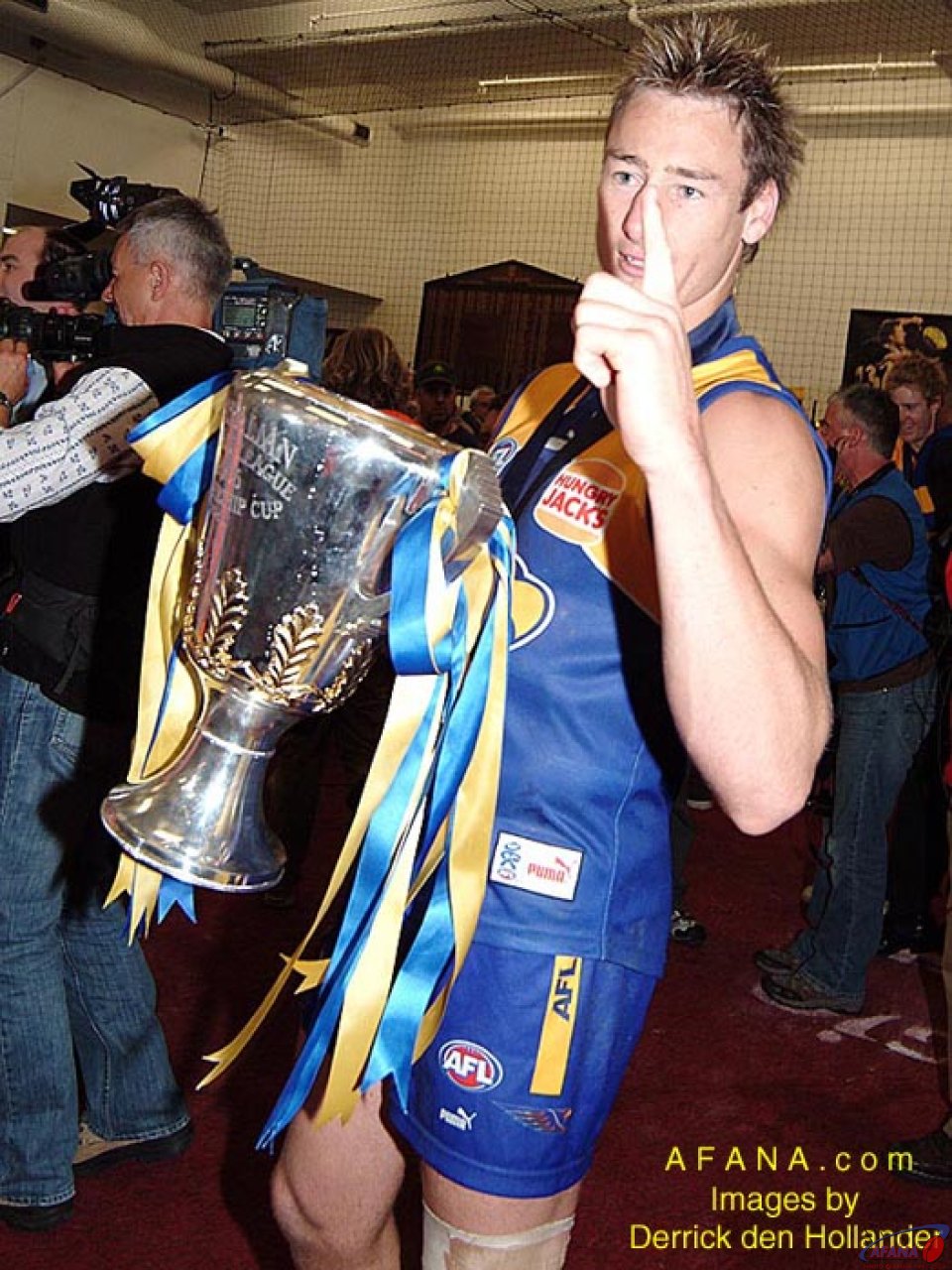 [b]The spils of victory, the treasured Premiers Cup and the no.1 salute[/b]