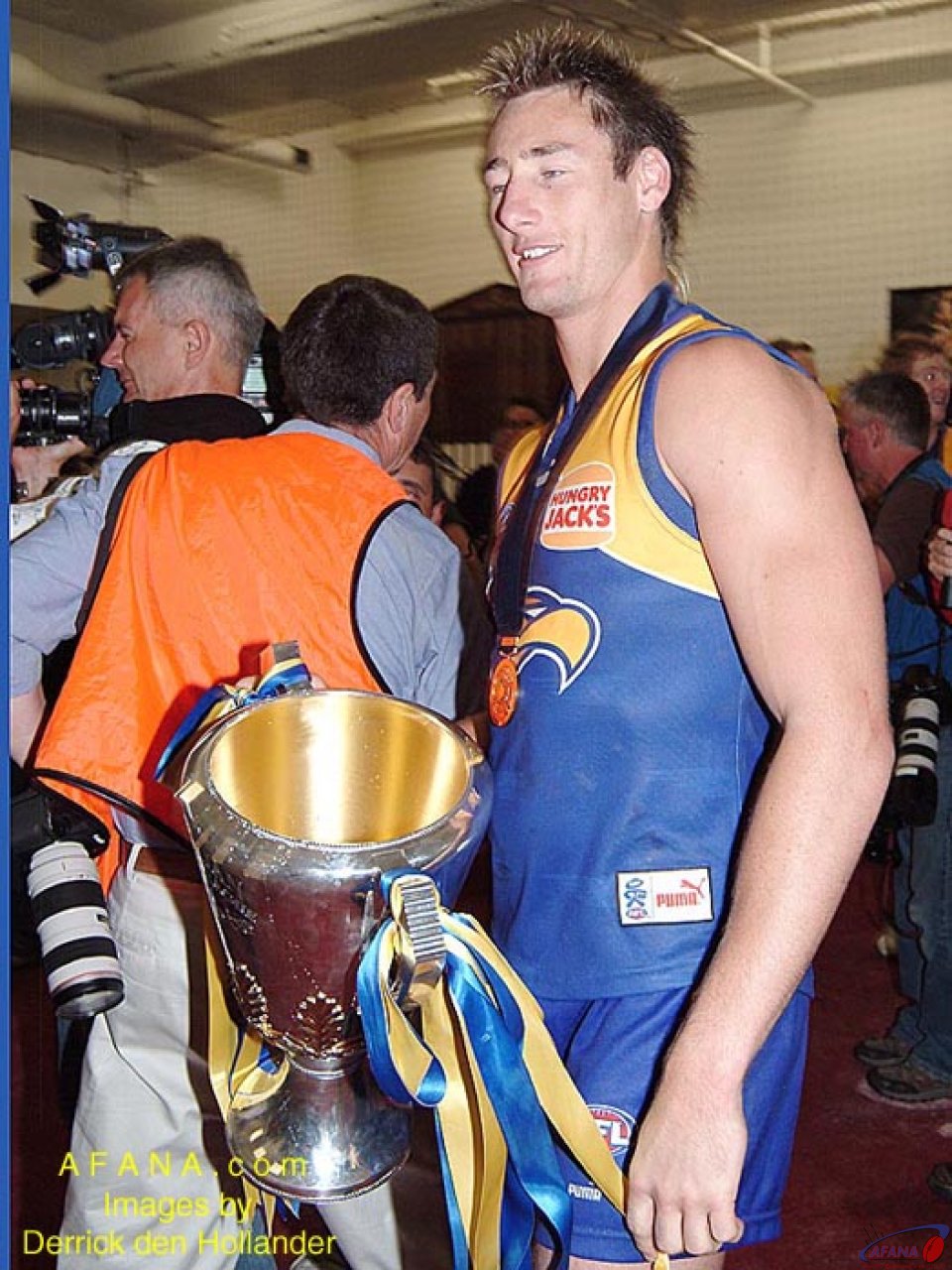 [b]With exhaultation comes exhaustion after the 2006 AFL Grand Final[/b]