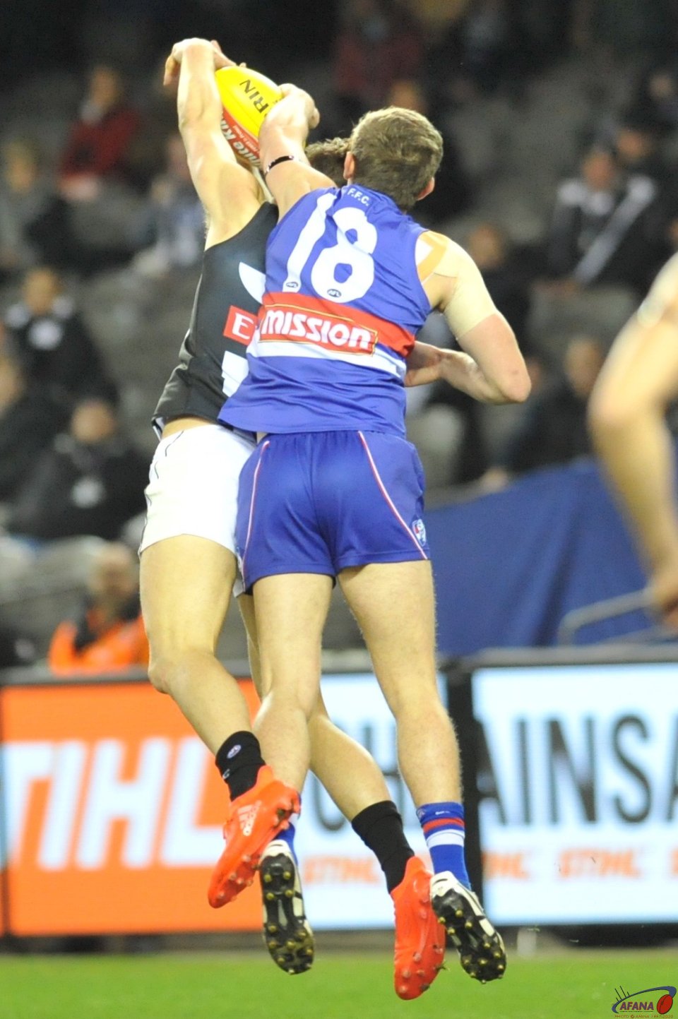 Darcy Moore marks as Flether Robrerts attempts to spoil