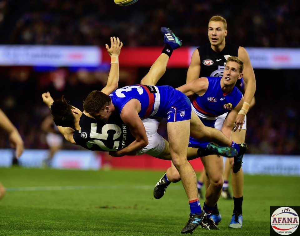 Dale Morris upends Carlton rookie Zac Fisher