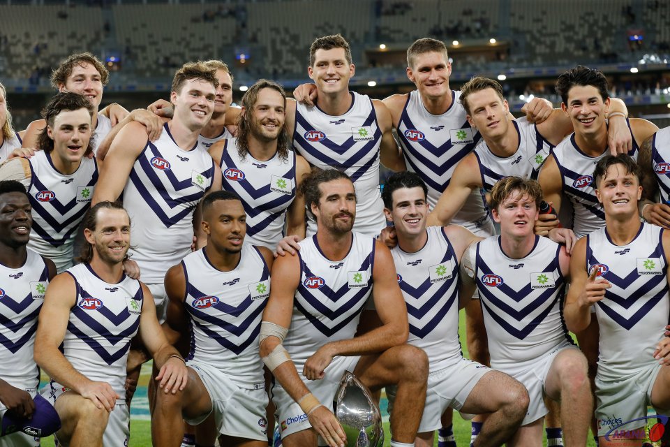 Dockers players celebrate their win