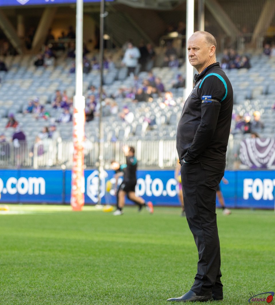 Ken Hinkley watches the warm up