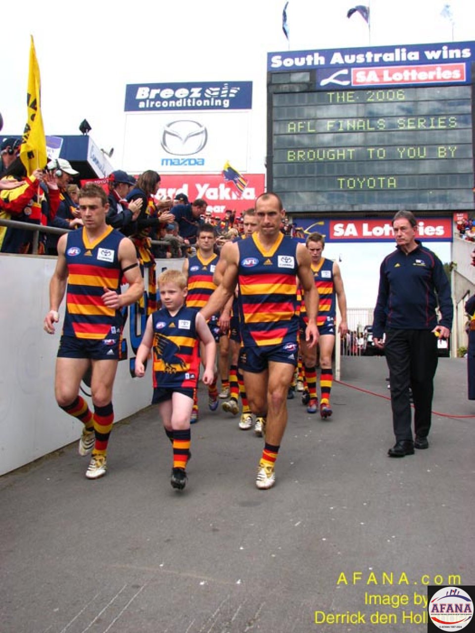 [b]Simon Goodwin and Tyson Edwards lead the Adelaide Crows out to battle[/b]