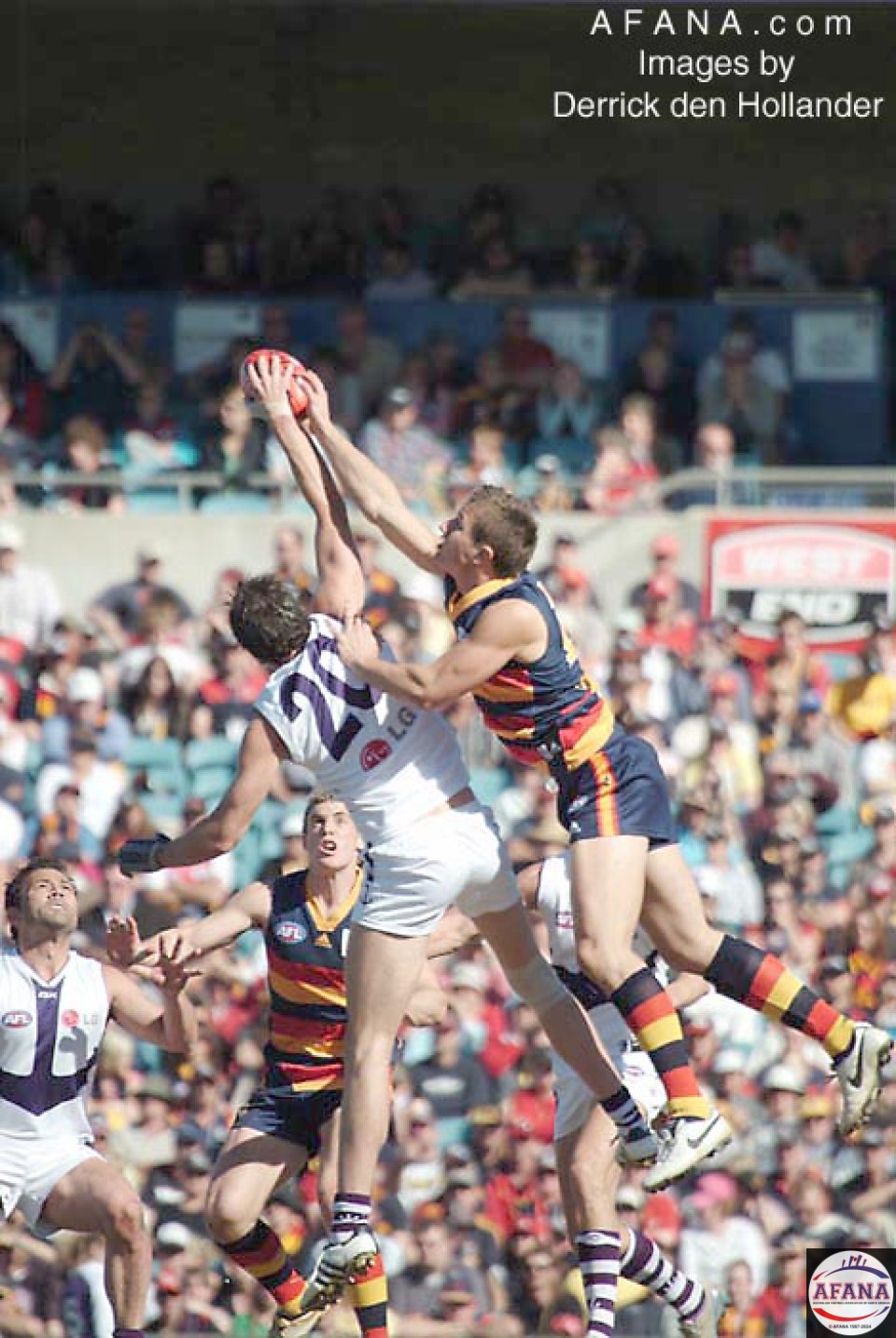 [b]The football is fiercely contested mid air in the Fremantle-v-Crows game[/b]