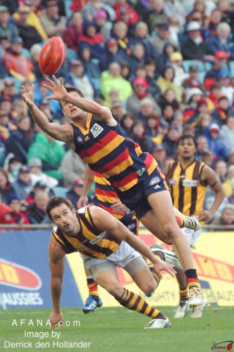 [b]A diving mark of the football by Crows defender Nathan Bassett[/b]