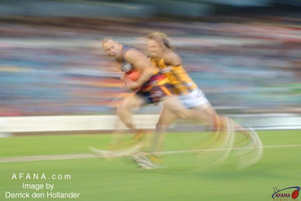 [b]Jason Torney in a speed blur at night during their match against Hawthorn[/b]