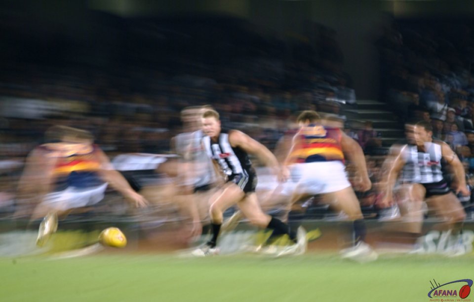 [b]Collingwood captain Nathan Buckley in the midfield, versus Adelaide, Telstra Dome[/b]