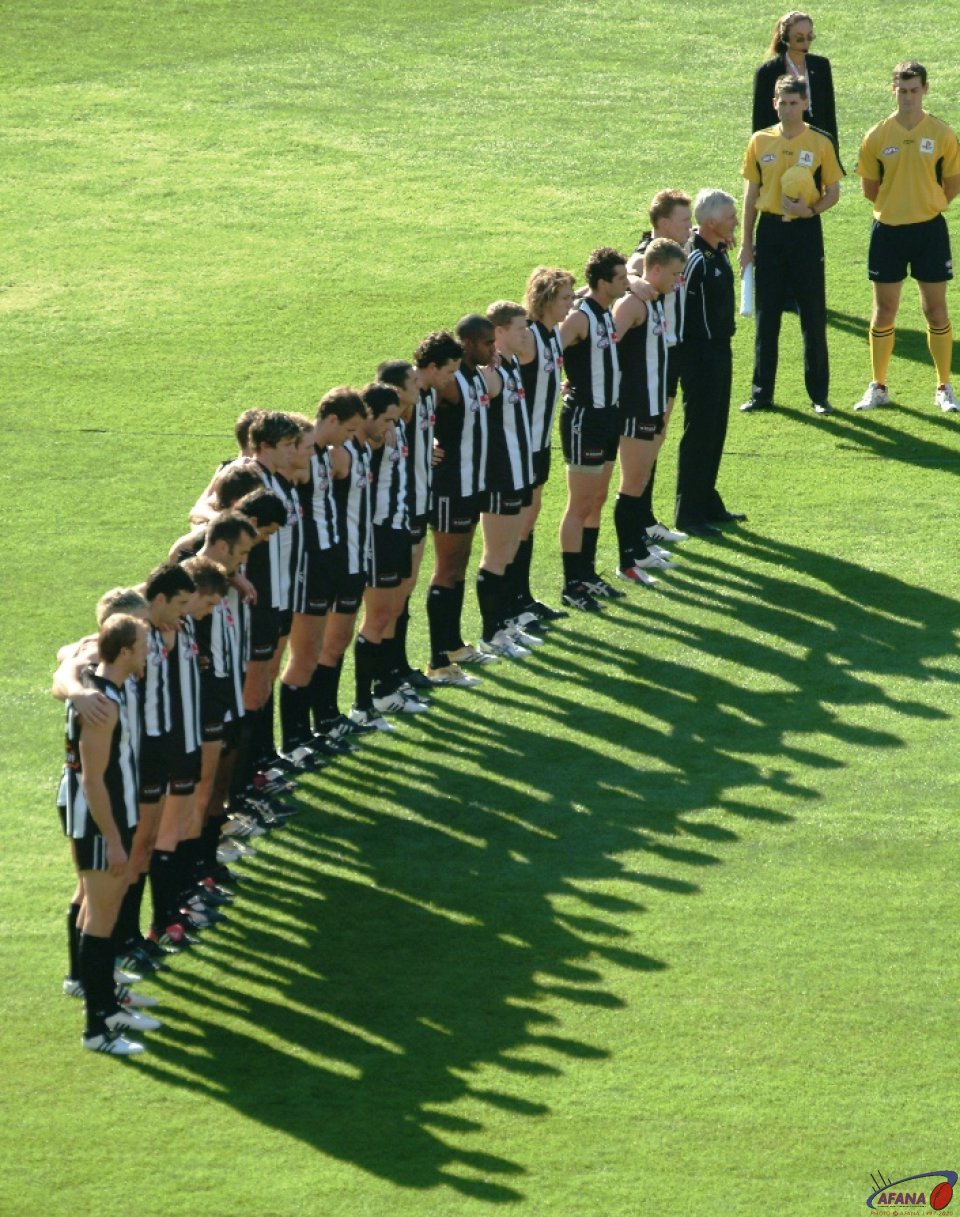 [b]Collingwood Magpies line up for the National Anthem at the MCG ANZAC Day game[/b]