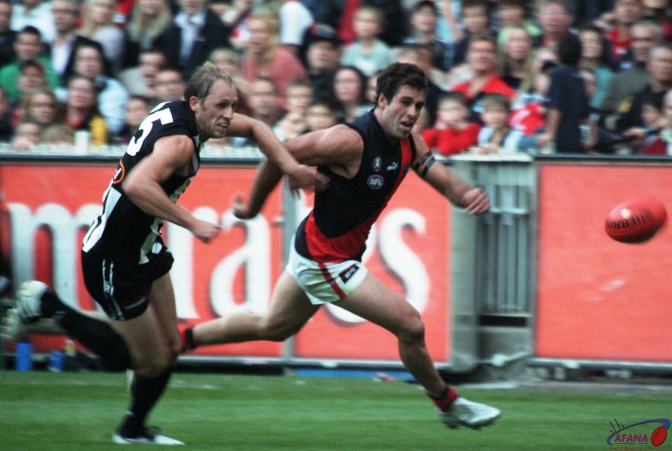 [b]Collingwood and Essendon fight for posession at the MCG[/b]
