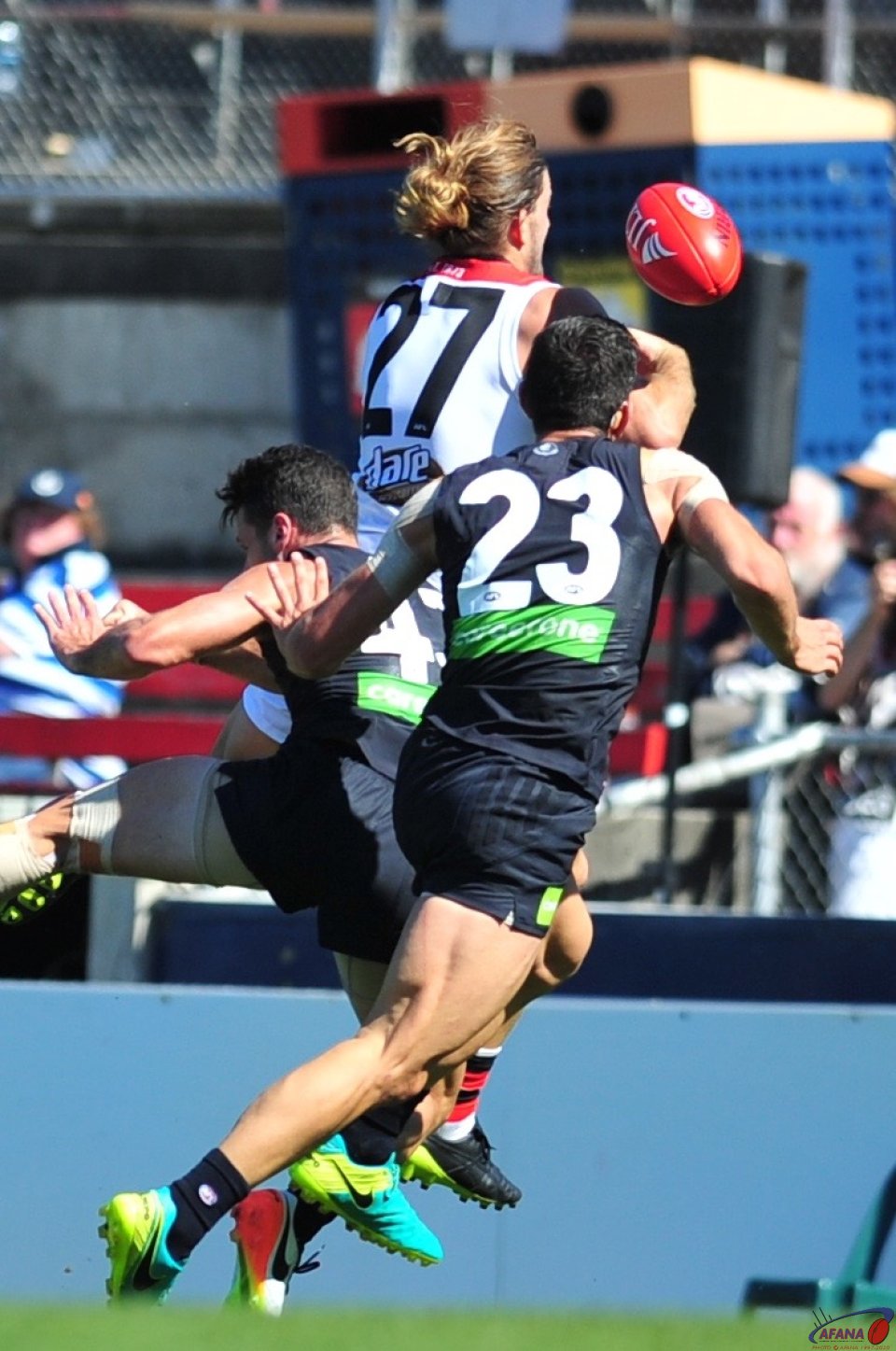 Josh Bruce and new Carlton recruit Jacob Weitering (23) go for the ball