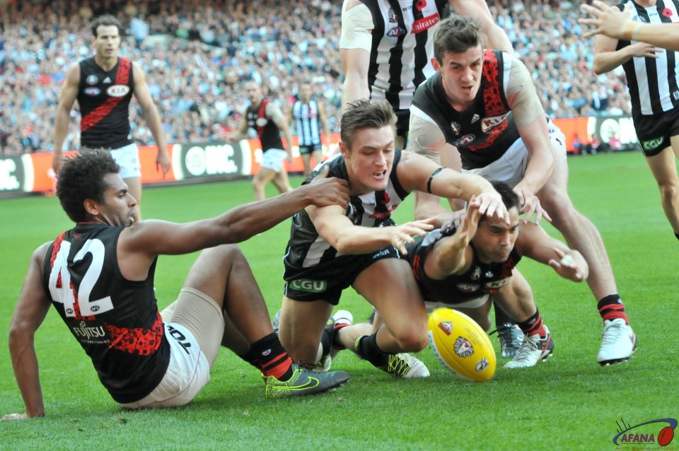 Taylor Adams pounces on the ball as the Bombers defence gets split