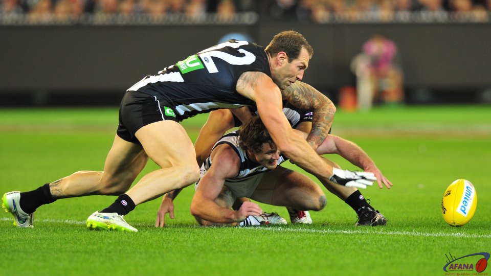 Double teamed by Cloke and Swan
