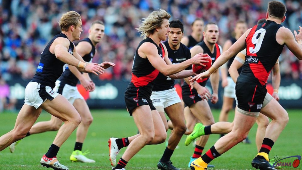 Dyson Heppell weaves through midfield traffic