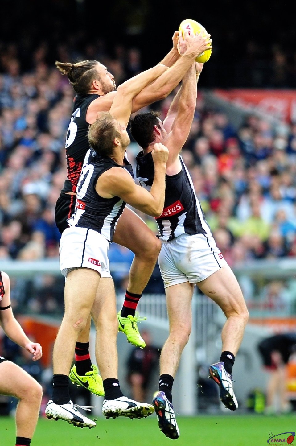 Cale Hooker takes a pack mark over Goldsack and Reid