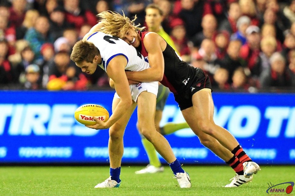 Bastinac is tackled by Heppell