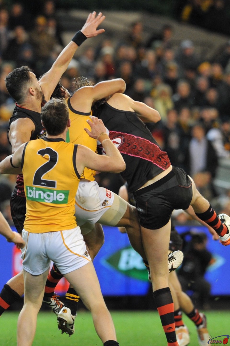 Joe Daniher takes a strong contested mark in front of Alex Rance, Dylan Grimes and Ryan Crowley