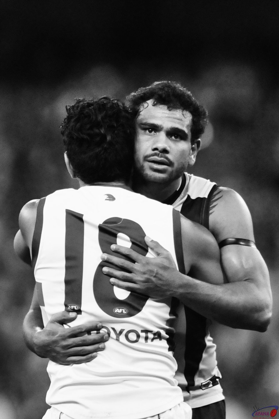 Foes on the ground brothers in arms Rioli and Betts