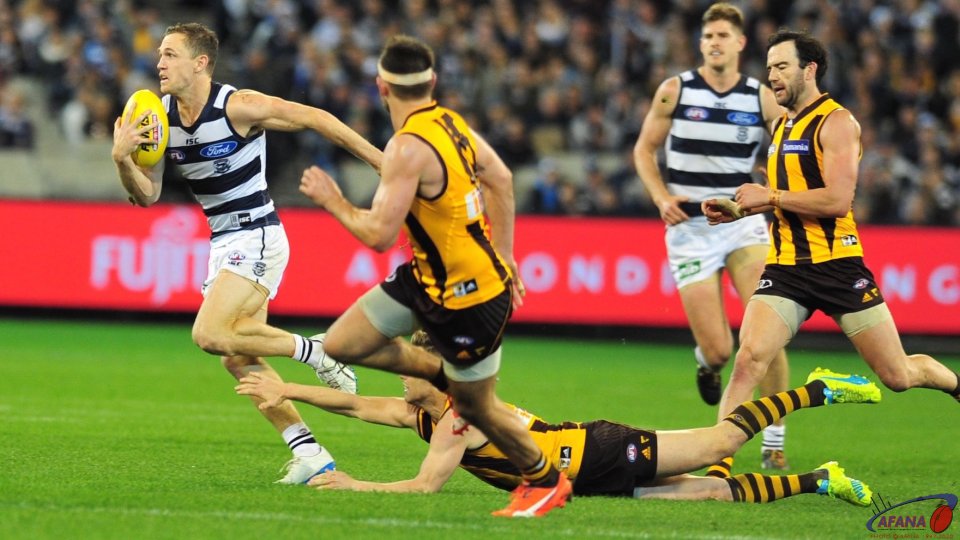 Selwood breaks the Mitchell tackle