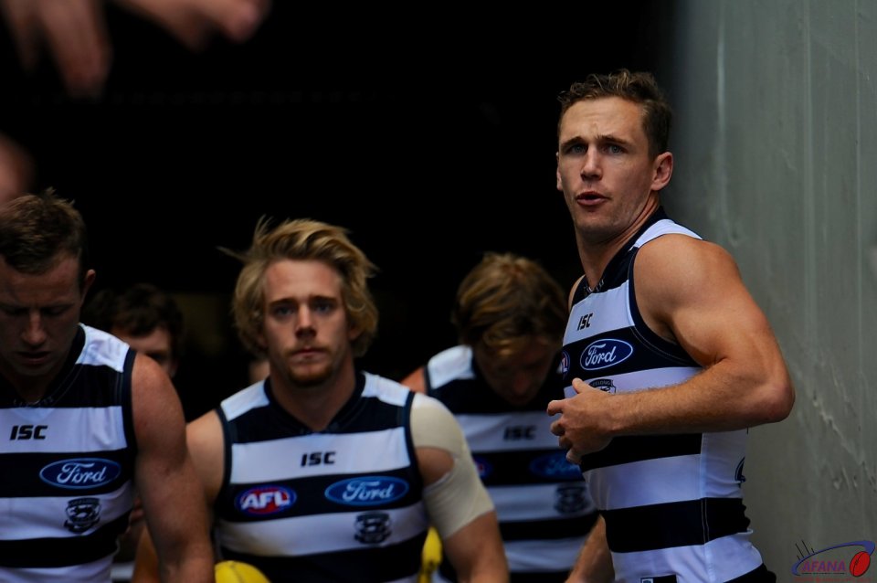Joel Selwood the Cats captain leads his team out of the players race.