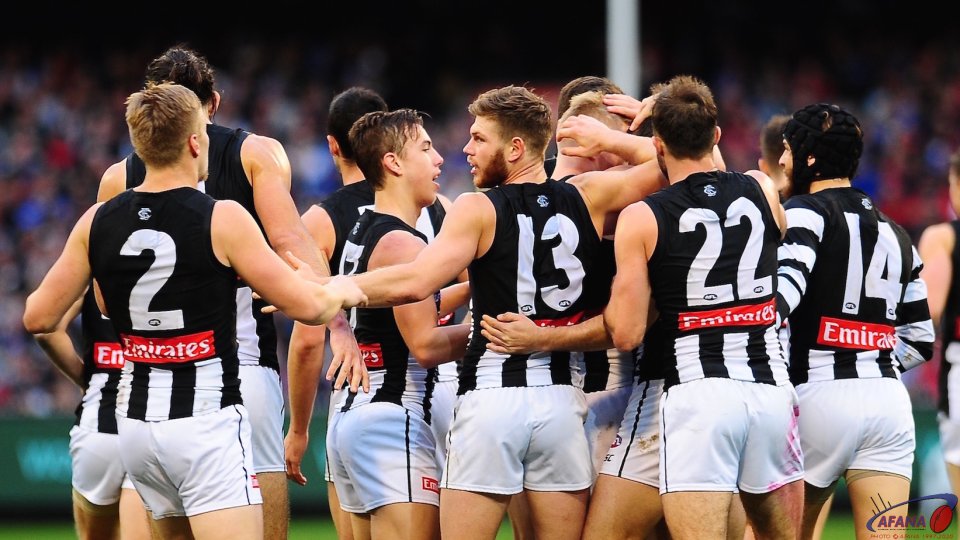 The boys rally around Alex Fasolo after his first game back following his depression announcement