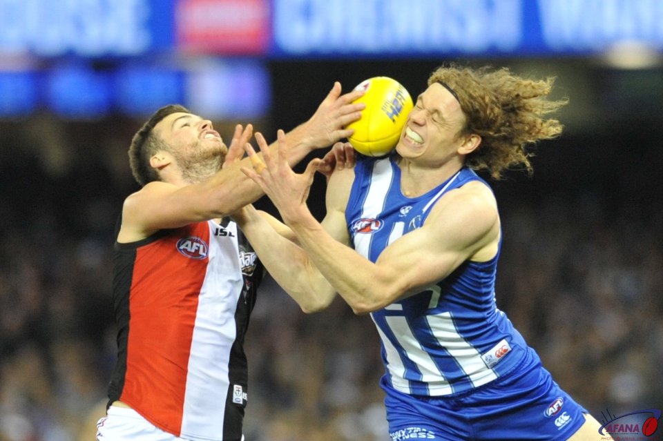 Brown contests the ball in as the Roberton spoils