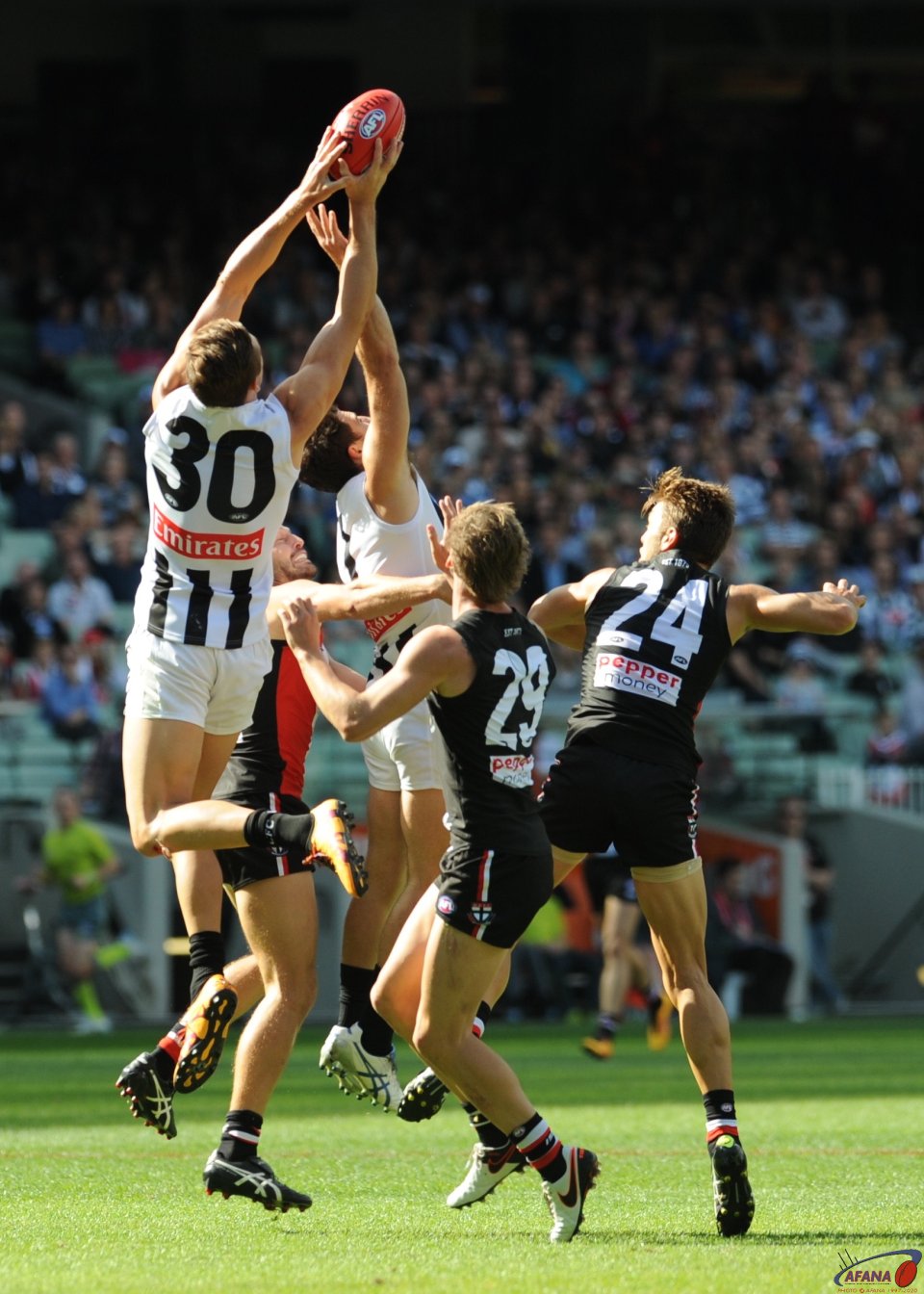 Darcy Moore marks above Alex fasolo as Jimmy Webster and Sean Dempster attempt to influence the contest